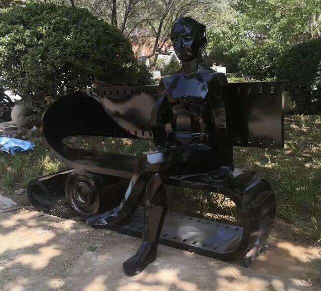 不锈钢切面人物雕塑胶卷座椅
